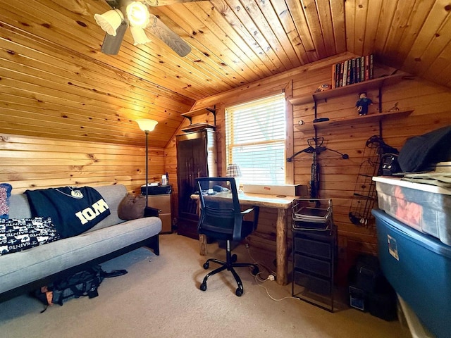 carpeted office featuring vaulted ceiling, wood walls, wood ceiling, and ceiling fan