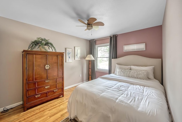1301 Temkin Ave, Madison, WI 53705 - bedroom with baseboards, light wood finished floors, and a ceiling fan