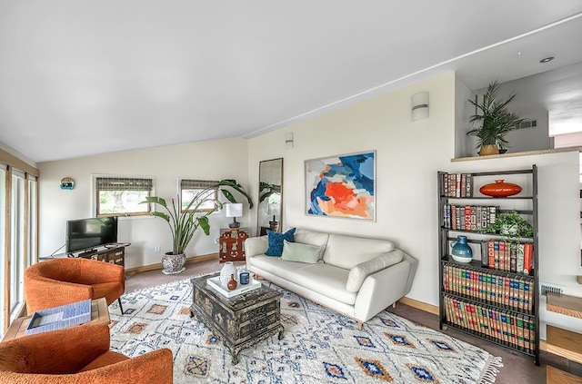 1301 Temkin Ave, Madison, WI 53705 - living area featuring lofted ceiling and baseboards