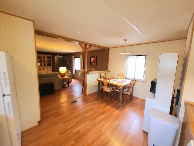 N9140 Snow Snake Trl, Necedah, WI 54646 - dining space featuring wood finished floors and visible vents
