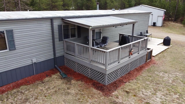 N9140 Snow Snake Trl, Necedah, WI 54646 - back of property featuring a wooden deck