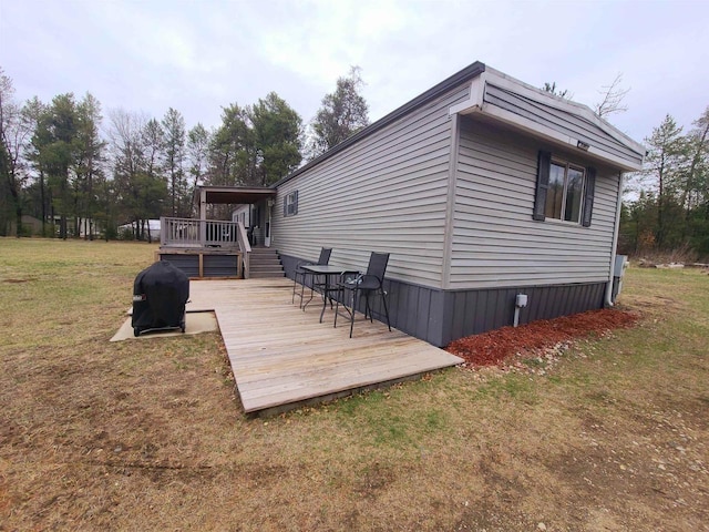 N9140 Snow Snake Trl, Necedah, WI 54646 - rear view of property with a yard and a deck