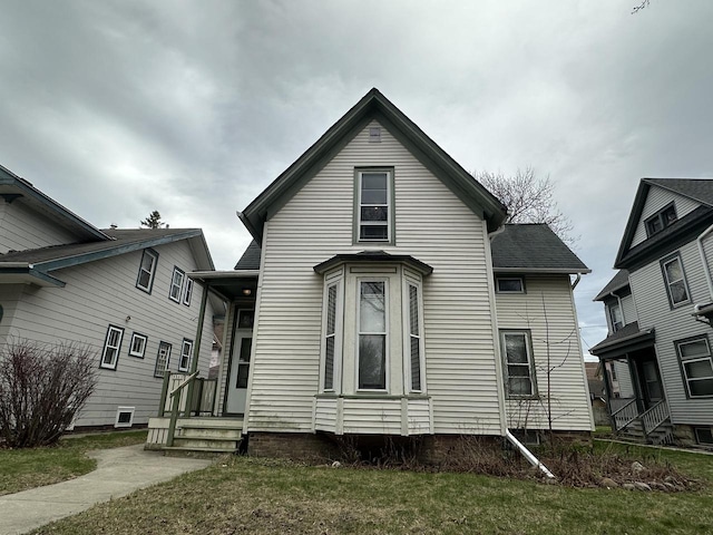 3313 W Kilbourn Ave, Milwaukee, WI 53208 - view of front facade with a front lawn