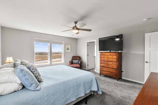 carpeted bedroom with baseboards and a ceiling fan