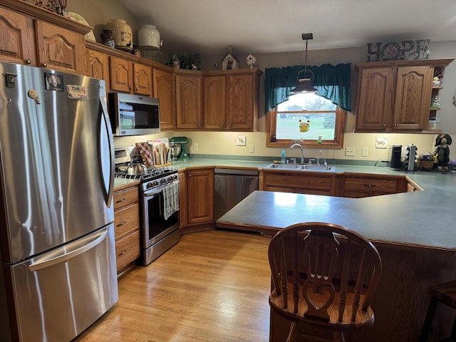 W360S10139 Markham Rd, Eagle, WI 53119 - kitchen featuring open shelves, a sink, light wood-type flooring, stainless steel appliances, and decorative light fixtures