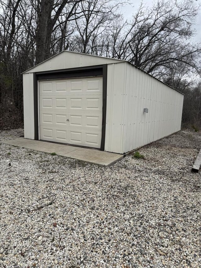 W360S10139 Markham Rd, Eagle, WI 53119 - detached garage featuring gravel driveway