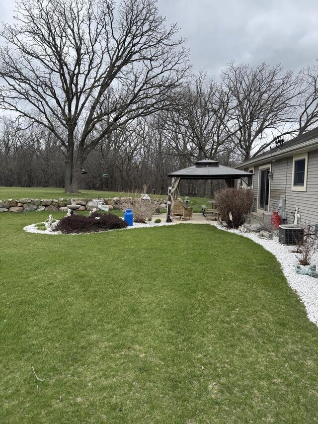 W360S10139 Markham Rd, Eagle, WI 53119 - view of yard featuring a gazebo and central AC