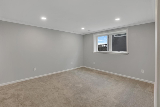 unfurnished room with baseboards, ornamental molding, carpet flooring, and recessed lighting