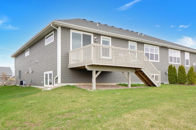 back of property featuring a lawn, a wooden deck, stairway, and cooling unit