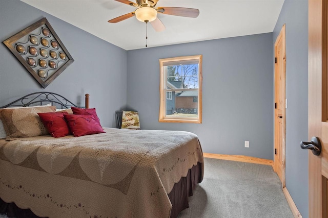905 Plymouth Ct, Nekoosa, WI 54457 - carpeted bedroom with a ceiling fan and baseboards