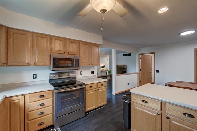 25 Cherbourg Ct, Madison, WI 53711 - kitchen with stainless steel appliances, light countertops, dark wood-style floors, a ceiling fan, and recessed lighting