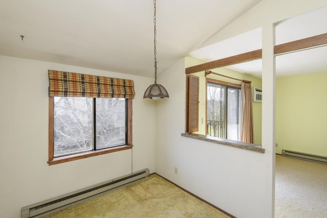 carpeted empty room with lofted ceiling and a baseboard radiator