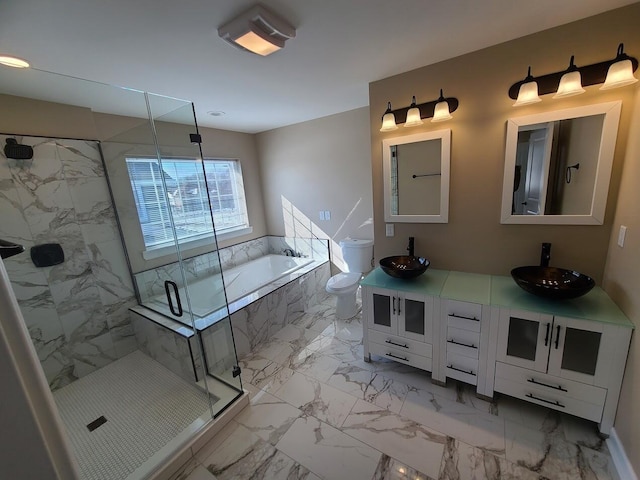 2034 N 13th St, Milwaukee, WI 53205 - bathroom featuring a garden tub, a marble finish shower, a sink, and marble finish floor
