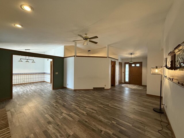 unfurnished living room featuring visible vents, baseboards, dark wood-type flooring, recessed lighting, and a ceiling fan