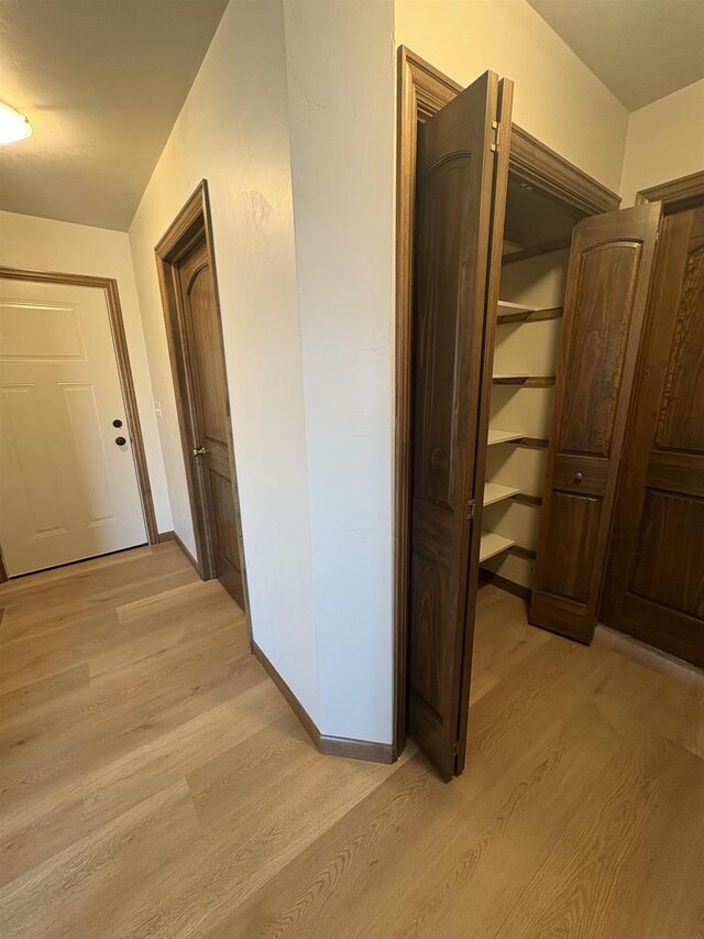 1354 Shelby Ln, De Pere, WI 54115 - hall featuring light wood-type flooring and baseboards