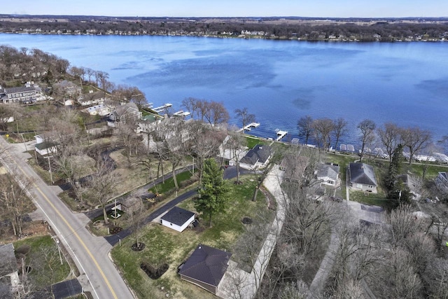 aerial view with a residential view and a water view