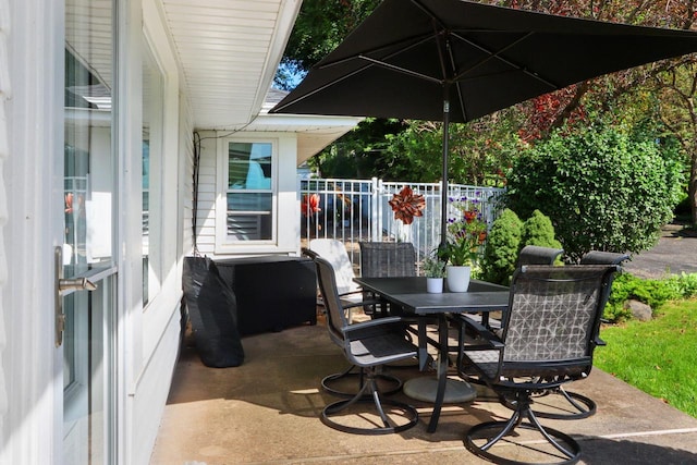 view of patio / terrace with fence and outdoor dining space