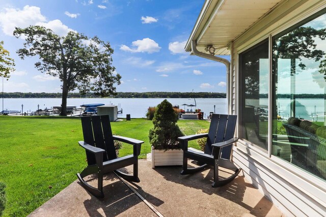 view of patio / terrace with a water view