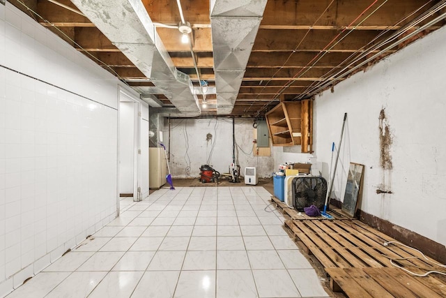 unfinished below grade area featuring electric panel