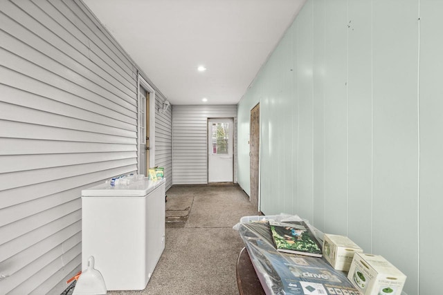 corridor featuring carpet floors and recessed lighting