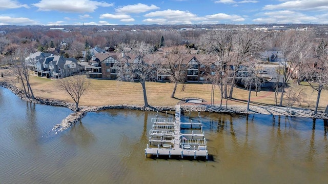 aerial view with a residential view and a water view