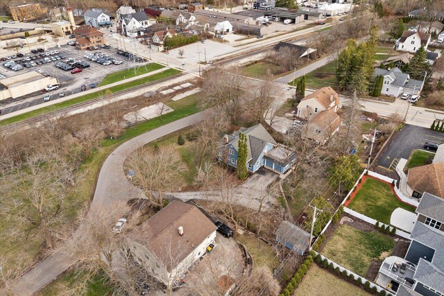 birds eye view of property with a residential view