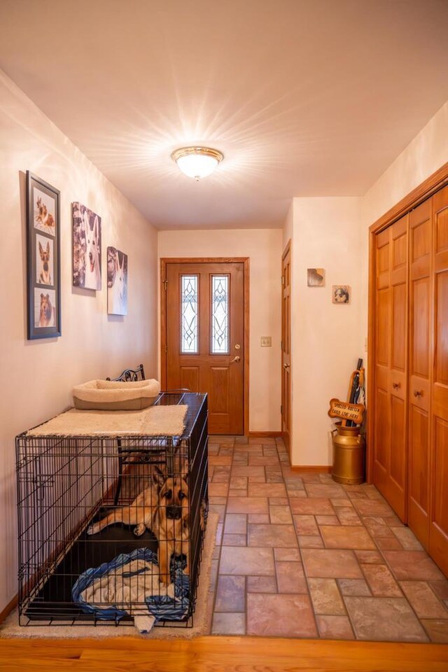 W3760 W Lemonweir Ct, Mauston, WI 53948 - foyer with baseboards and stone finish floor