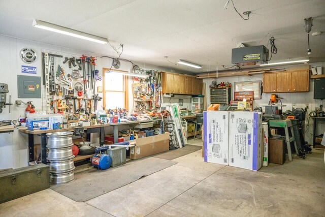 W3760 W Lemonweir Ct, Mauston, WI 53948 - garage with electric panel and a workshop area