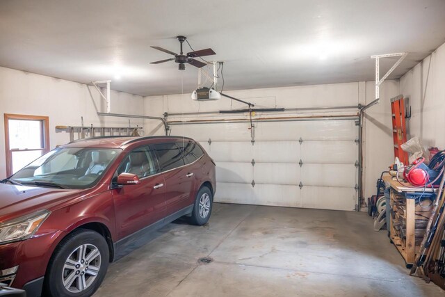 W3760 W Lemonweir Ct, Mauston, WI 53948 - garage with a ceiling fan and a garage door opener