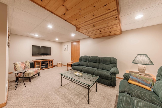 living area with baseboards, carpet floors, and recessed lighting