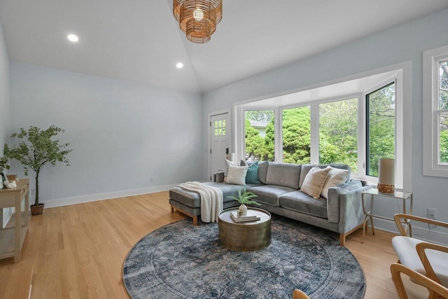 5308 Mckenna Rd, Monona, WI 53716 - living area featuring vaulted ceiling, healthy amount of natural light, light wood-type flooring, and recessed lighting