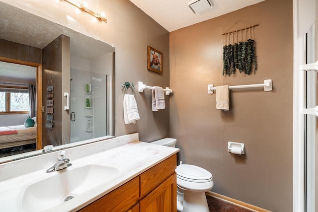 bathroom featuring a shower stall, vanity, connected bathroom, toilet, and baseboards