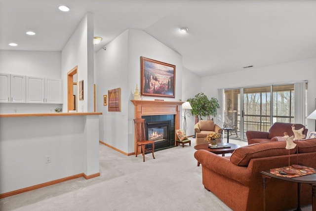 living room with a fireplace with flush hearth, light carpet, baseboards, lofted ceiling, and recessed lighting