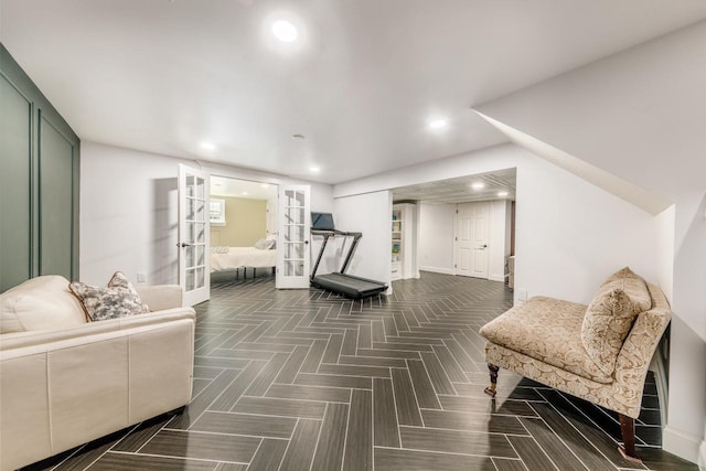 sitting room featuring recessed lighting, baseboards, and french doors
