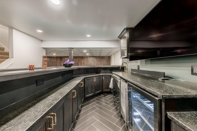 kitchen featuring recessed lighting and beverage cooler