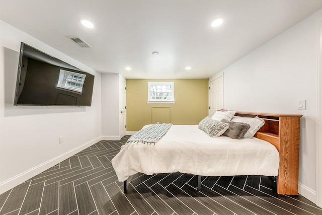 bedroom featuring recessed lighting, visible vents, and baseboards