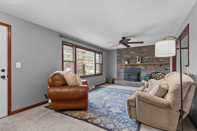 living room with carpet flooring, baseboards, visible vents, and ceiling fan