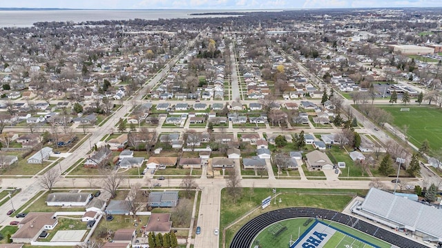 aerial view with a water view and a residential view