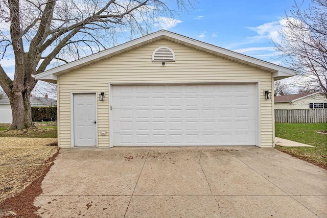 detached garage with fence