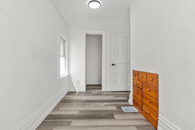 76 E Johnson St, Fond Du Lac, WI 54935 - hall featuring baseboards and wood finished floors