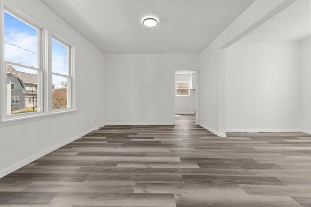 76 E Johnson St, Fond Du Lac, WI 54935 - unfurnished room with baseboards and wood finished floors