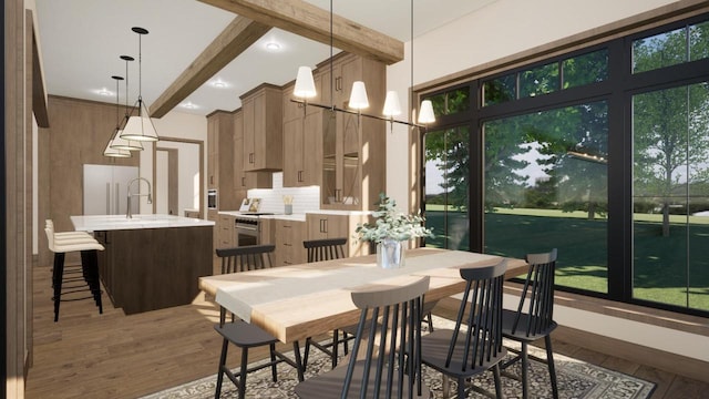 W2600 Oakwood Beach Rd, Markesan, WI 53946 - dining area featuring beam ceiling, wood finished floors, and plenty of natural light