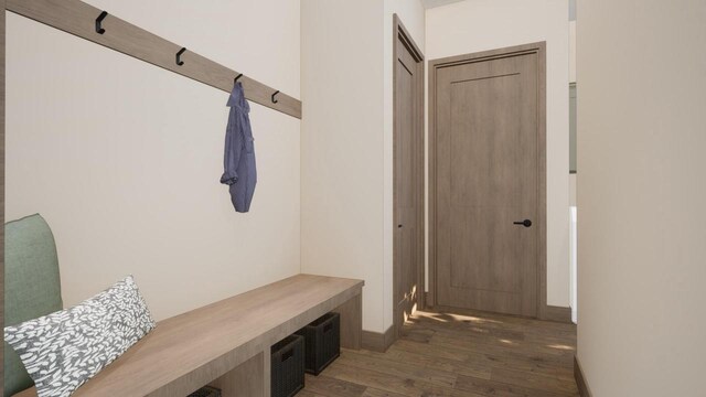 W2600 Oakwood Beach Rd, Markesan, WI 53946 - mudroom featuring baseboards and wood finished floors