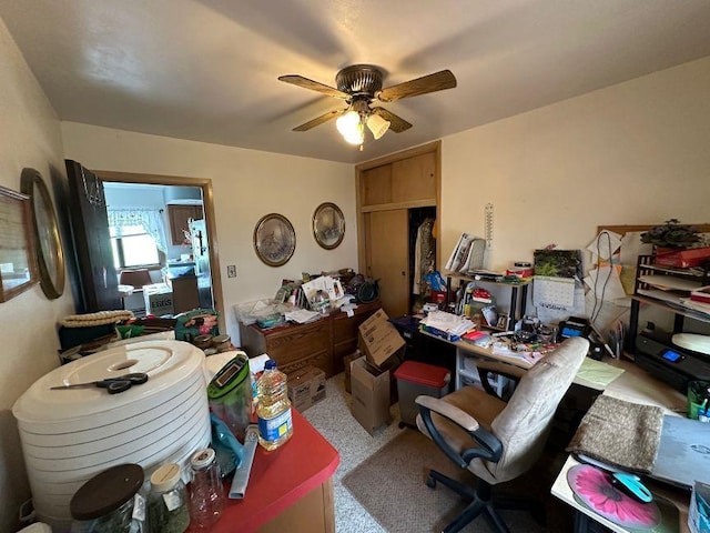 office area with a ceiling fan