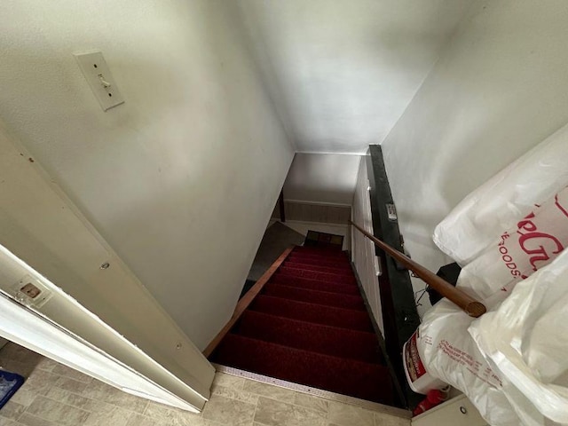 stairs with lofted ceiling