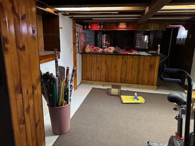 workout area featuring indoor bar