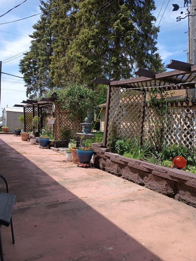 view of patio / terrace with fence