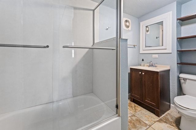 1931 Wood St, La Crosse, WI 54603 - bathroom featuring vanity, shower / bath combination with glass door, and toilet