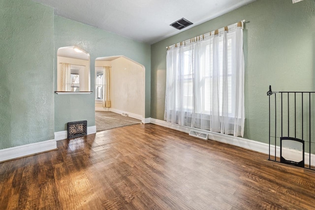 1931 Wood St, La Crosse, WI 54603 - spare room featuring a textured wall, visible vents, and a healthy amount of sunlight