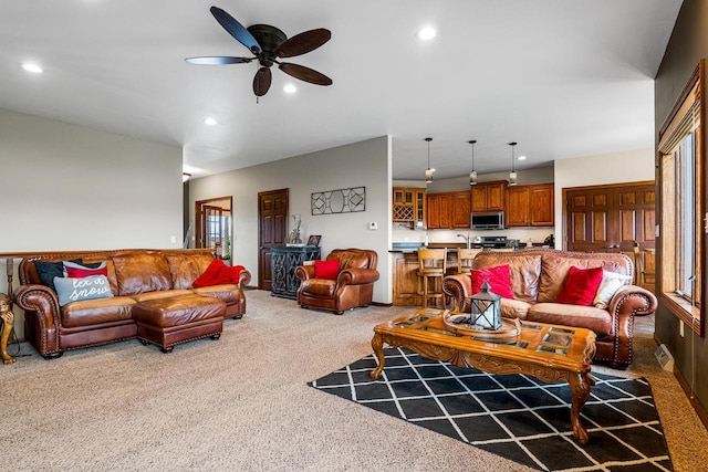 carpeted living room featuring recessed lighting and ceiling fan